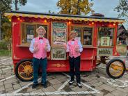 Halloween Party - Popcorn truck with two men in red and white strip vests handing out popcorn