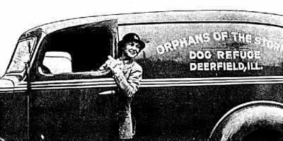 Black and white photo of woman with hat getting out of an Orphans of the Storm van