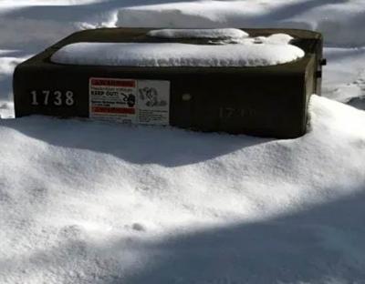 ComEd box covered by snow