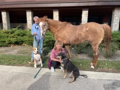 Riverwoods Residents, Howard and Ruth Konowitz with their dogs and horse
